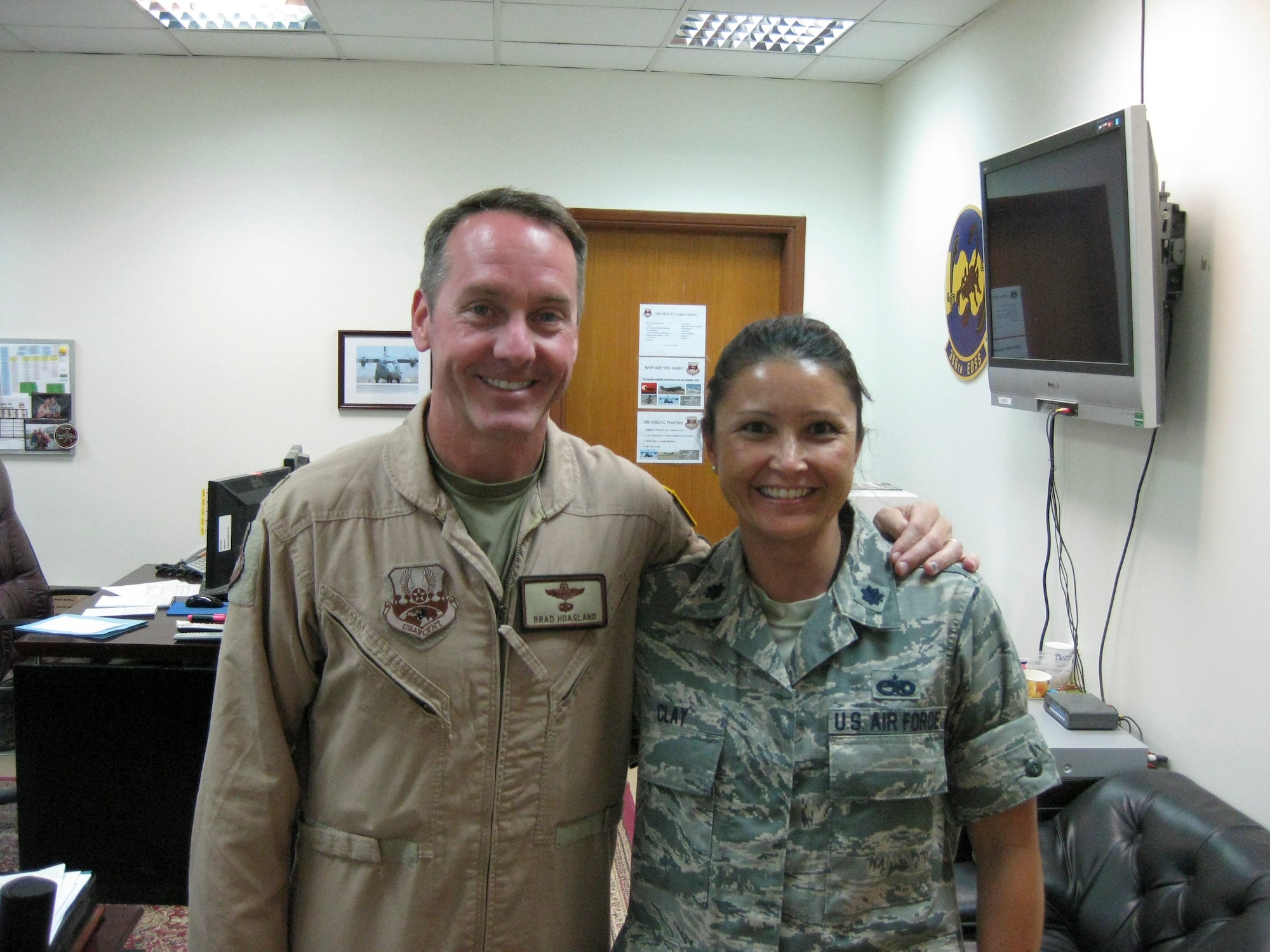 Col. Brad Hoagland and Lt. Col. Elizabeth Clay pose for a photo at the 386th Air Expeditionary Wing, Southwest Asia. Both Clay and Hoagland are from the same hometown in Elyria, Ohio and are currently serving together at the 386th AEW. (courtesy photo)