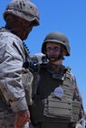 Ryan Forbes, a 13 year-old native of San Diego, talks with Marines of Lima Battery, 3rd Battalion, 11th Marine Regiment, about the weapon systems and lifestyles of the Marines at Marine Corps Air Ground Combat Center Twentynine Palms May 13, 2014. Forbes was an honorary Marine for a day with the battalion. He was accompanied by his parents and brother, and attended training with the battery, participating in drills and eating lunch with a section. Forbes has wanted to join the military for several years and spends time learning about the different branches. He was diagnosed with medulloblastoma, a form of brain cancer in January. His diagnosis and current treatment for medullablastoma hasnt hampered his enthusiasm for the military.