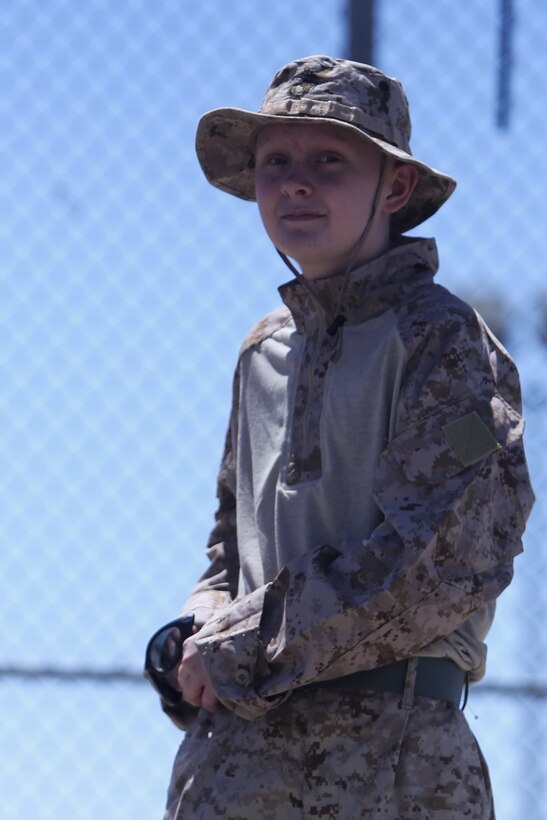 Ryan Forbes, a 13 year-old native of San Diego, was an honorary Marine for a day with service members of Lima Battery, 3rd Battalion, 11th Marine Regiment, at Marine Corps Air Ground Combat Center Twentynine Palms May 13, 2014. Forbes, accompanied by his parents and brother, attended training with the battery, participating in drills and eating lunch with a section. Forbes has wanted to join the military for several years and spends time learning about the different branches. He was diagnosed with medulloblastoma, a form of brain cancer in January. His diagnosis and current treatment for medullablastoma hasnt hampered his enthusiasm for the military.