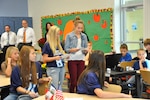 Kati Kelley and Hallie Bess give their portions of a presentation on the West Virginia Pumpkin Festival to students at the Buckingham School in Lima, Peru in 2013. Both girls are students in Lora Rice’s Spanish I class at Milton Middle School. The school is participating in a learning alliance as part of the West Virginia National Guard’s State Partnership Program. 