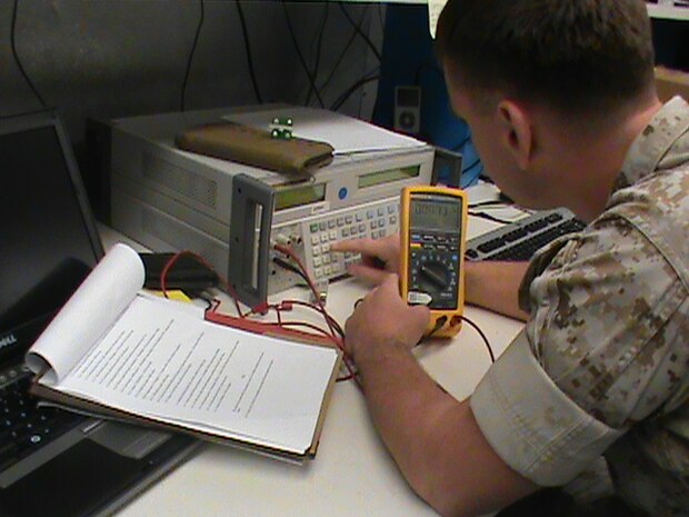 A Marine calibrates a multimeter, a device used to measure properties of electricity such as voltage, current and resistance, using the multimeter workstation standards from the Expeditionary Test, Diagnostic and Measurement Equipment Maintenance System. The ETMS lets Marines calibrate test equipment in 28 different test areas. 