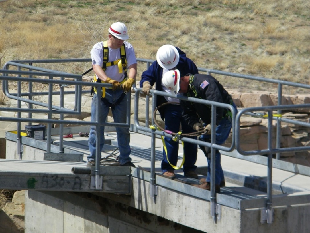 CONCHAS DAM, N.M., -- Corps' employeess performing a periodic inspection of the dam's irrigation headworks. Photo by Antonio Urquidez, April 13, 2010.