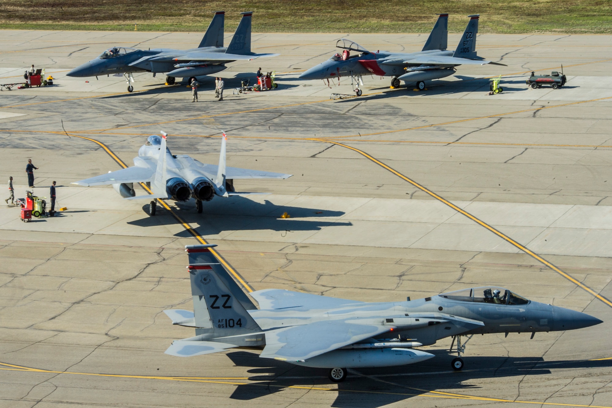 U.S. Air Force F-15 Eagles assigned to the 67th Fighter Squadron, Kadena Air Base, Japan, taxi during RED FLAG-Alaska 14-1 May 14, 2014, Eielson Air Force Base, Alaska. The F-15 is an air-superiority fighter capable of detecting, acquiring, tracking and attacking enemy aircraft. (U.S. Air Force photo by Senior Airman Joshua Turner/Released)