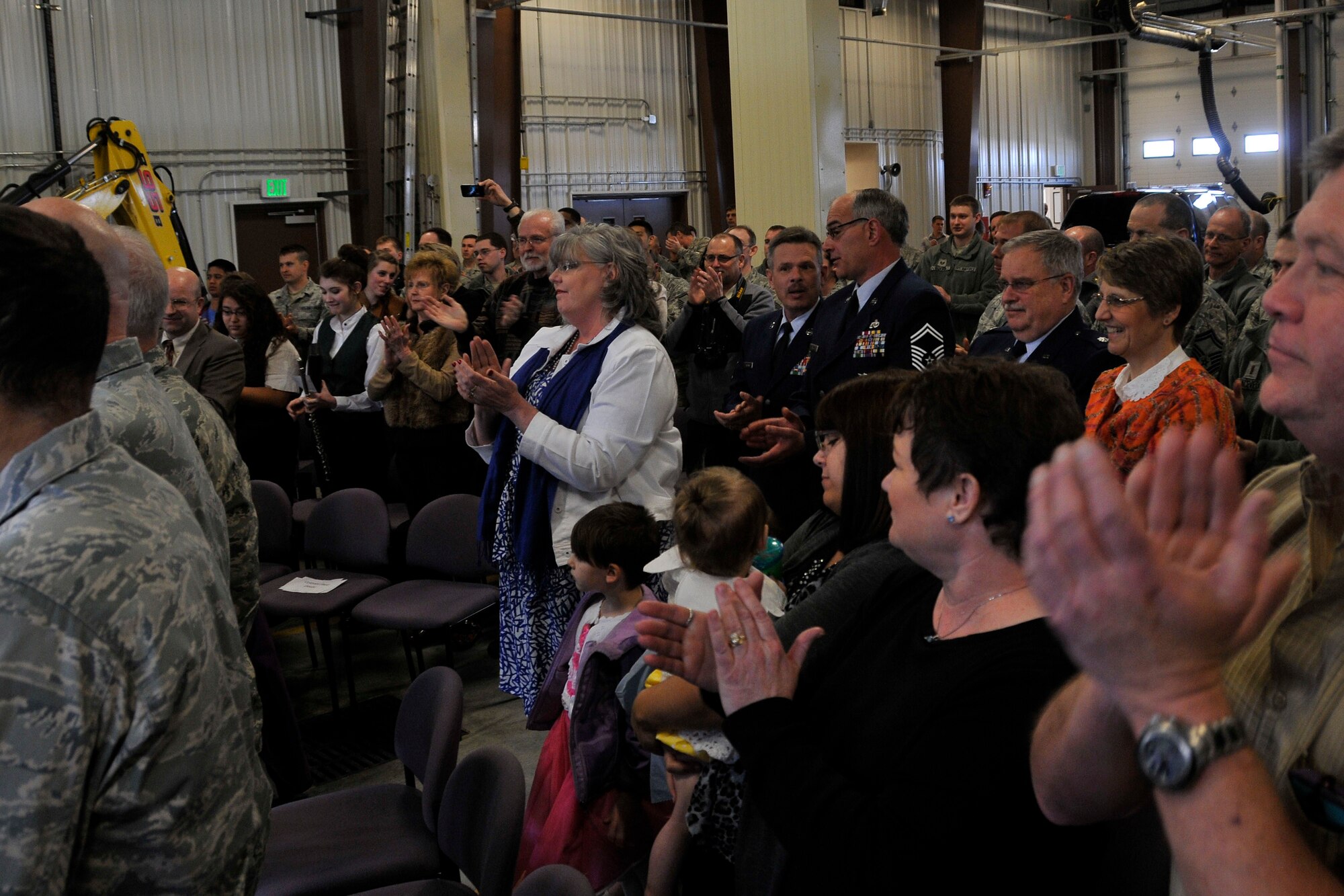 JOINT BASE ELMENDORF-RICHARDSON, Alaska -- Members of the 176 Wing and local community give Lt. Col. Ed Soto a steps down from command of the 176 Civil Engineer Squadron here April 13, 2024. The 176 CES recieved its newest commander, Lt. Col. Jack Evans, here April 13, 2014, and bid farewell to its previous commander of 17 years. U.S. Air National Guard photo by Staff Sgt N. Alicia Halla/ Released