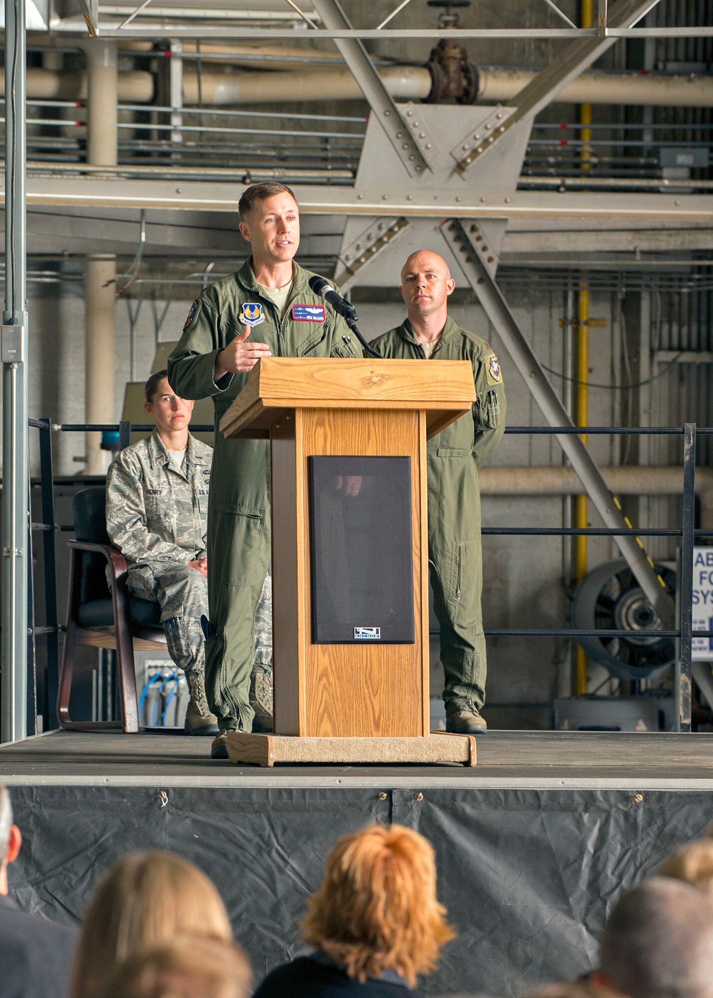 Lt. Col. Michael Williams, speaks to Edwards personnel after assuming command of the 419th Flight Test Squadron during a ceremony at Hangar 1210 on May 9, 2014. Colonel Williams assumed command from the outgoing commander, Col. Jason Wierzbanowski. (U.S. Air Force photo by Jet Fabara)