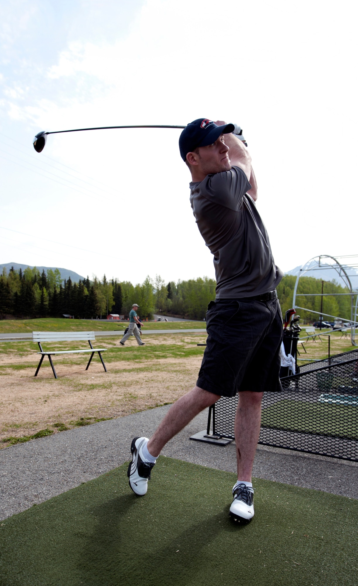Senior Airman Nathan Skoog, 673d Medical Operations Squadron emergency responder paramedic, practices his swing at the Moose Run Golf Course on Joint Base Elmendorf-Richardson, Alaska, May 13, 2014.  Military members, their families and members from the community can participate in the ‘Get Golf Ready’ program for their introductory golf lessons by golf professionals through June 9. (U.S. Air Force photo/Airman 1st Class Tammie Ramsouer)