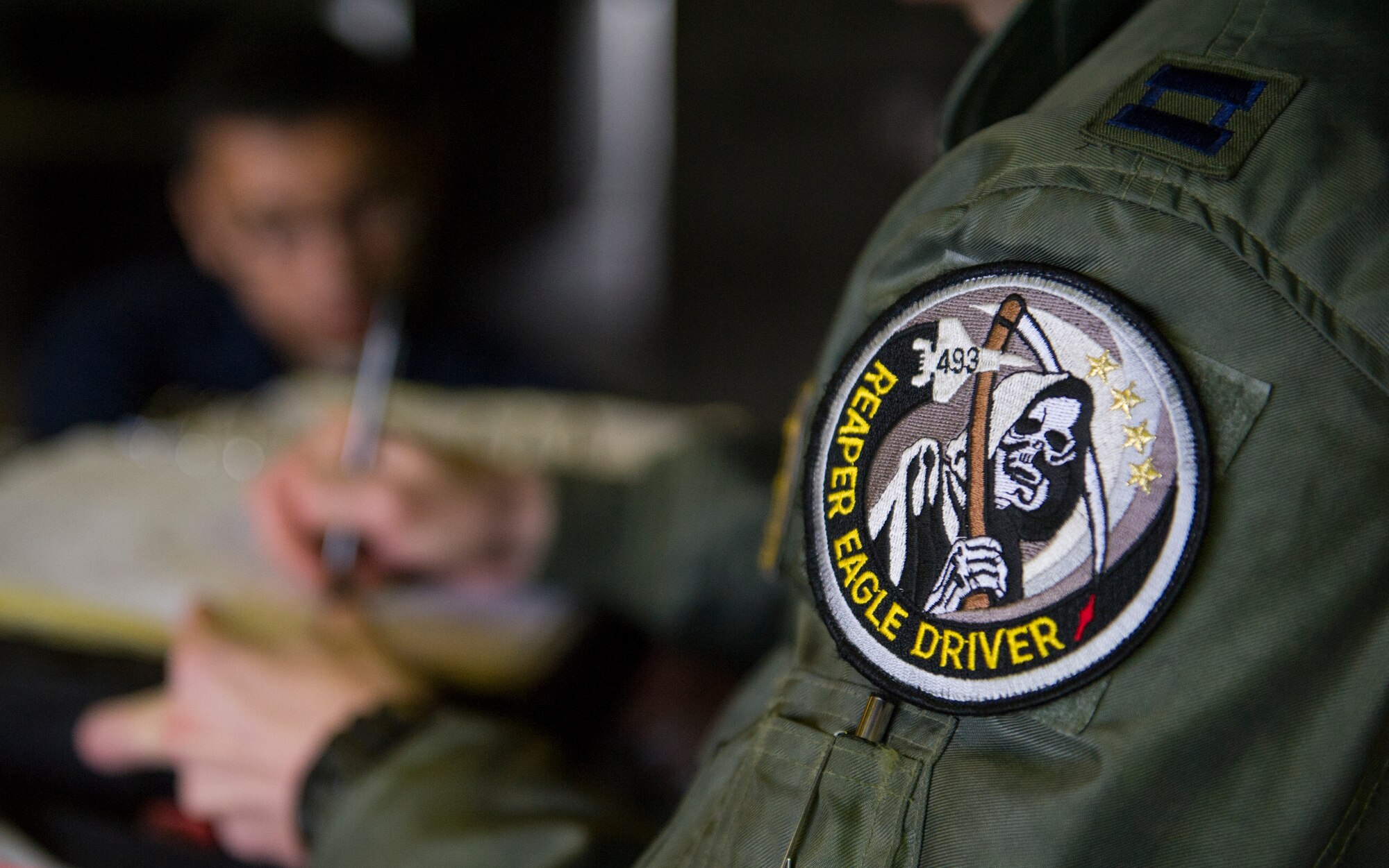 KEFLAVIK, Iceland – An F-15C Eagle pilot, signs off on maintenance forms after preparing an F-15 for short-notice takeoffs at Keflavik Airport, Iceland, May 14, 2014. The pilot is deployed for Icelandic Air Policing, which is part of NATOs commitment to keep Iceland’s airspace safe and secure. (U.S. Air Force photo/Tech. Sgt. Benjamin Wilson)(Released)