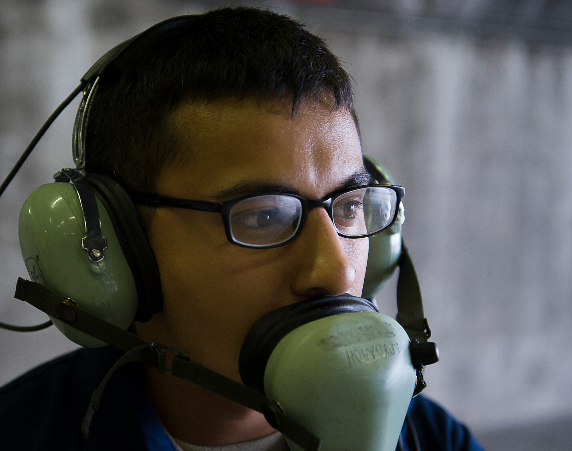KEFLAVIK, Iceland – Airman 1st Class Gumecindo Bravo, 48th Air Expeditionary Group crew chief, speaks to a pilot while preparing an aircraft for takeoff at Keflavik Airport, Iceland, May 14, 2014. The crew chief is certifying to scramble for takeoff so he can perform the mission of protecting Iceland’s airspace while deployed for Icelandic Air Policing. (U.S. Air Force photo/Tech. Sgt. Benjamin Wilson)(Released)