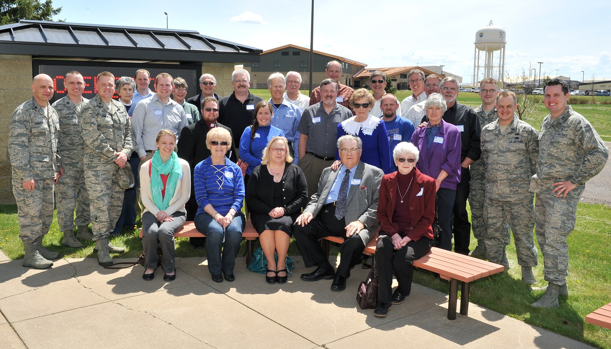 Clergy from the Great Falls, Mont., community pose with the Malmstrom Air Force Base Chaplain Corps outside the base chapel May 13 at the conclusion of Clergy Day. Approximately 25 visitors representing more than 15 local ministries attended the event. (U.S. Air Force photo / John Turner)