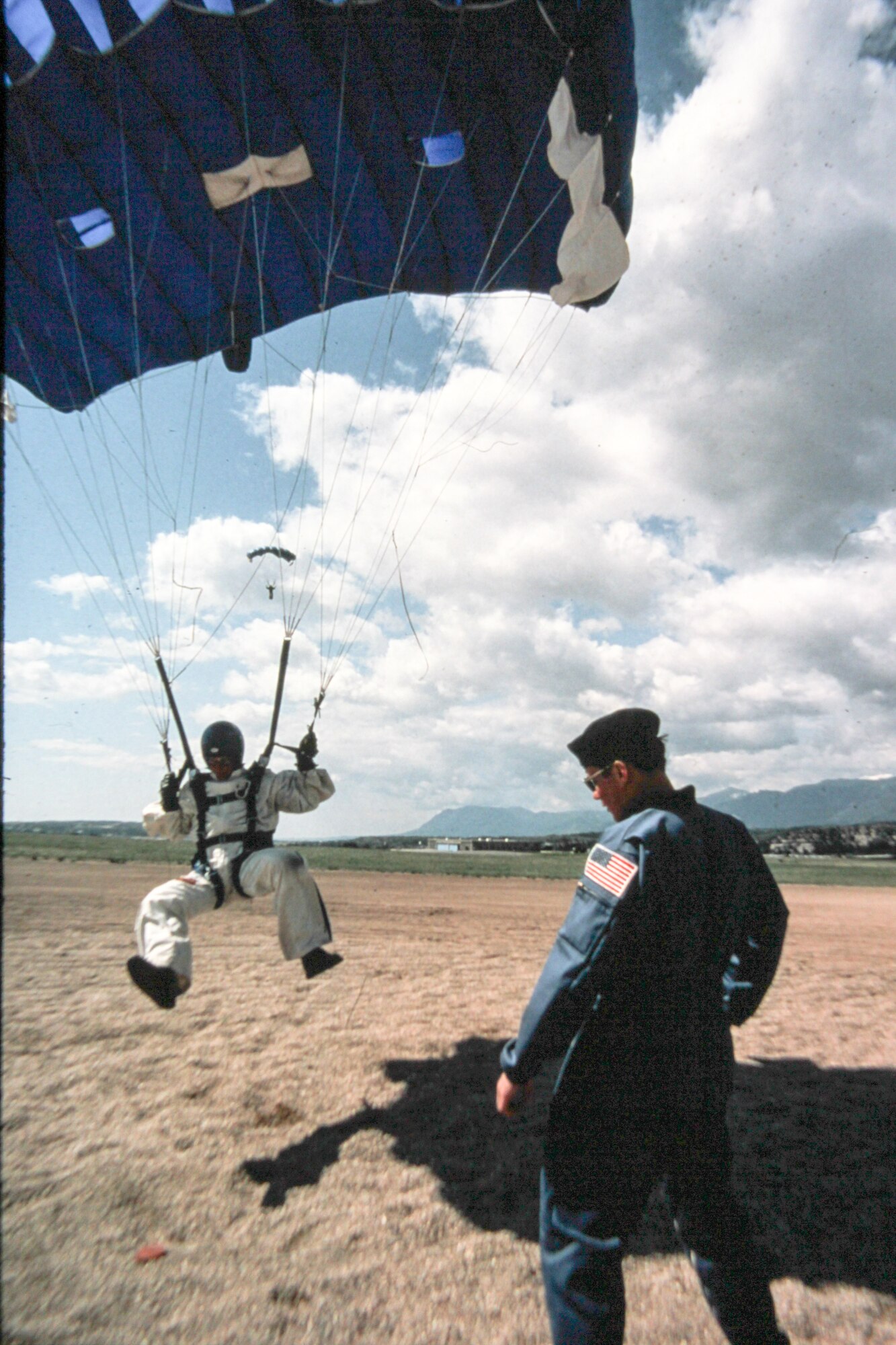 Wings of Blue team member performing a landing in the 1980's. (Courtesy Photo)