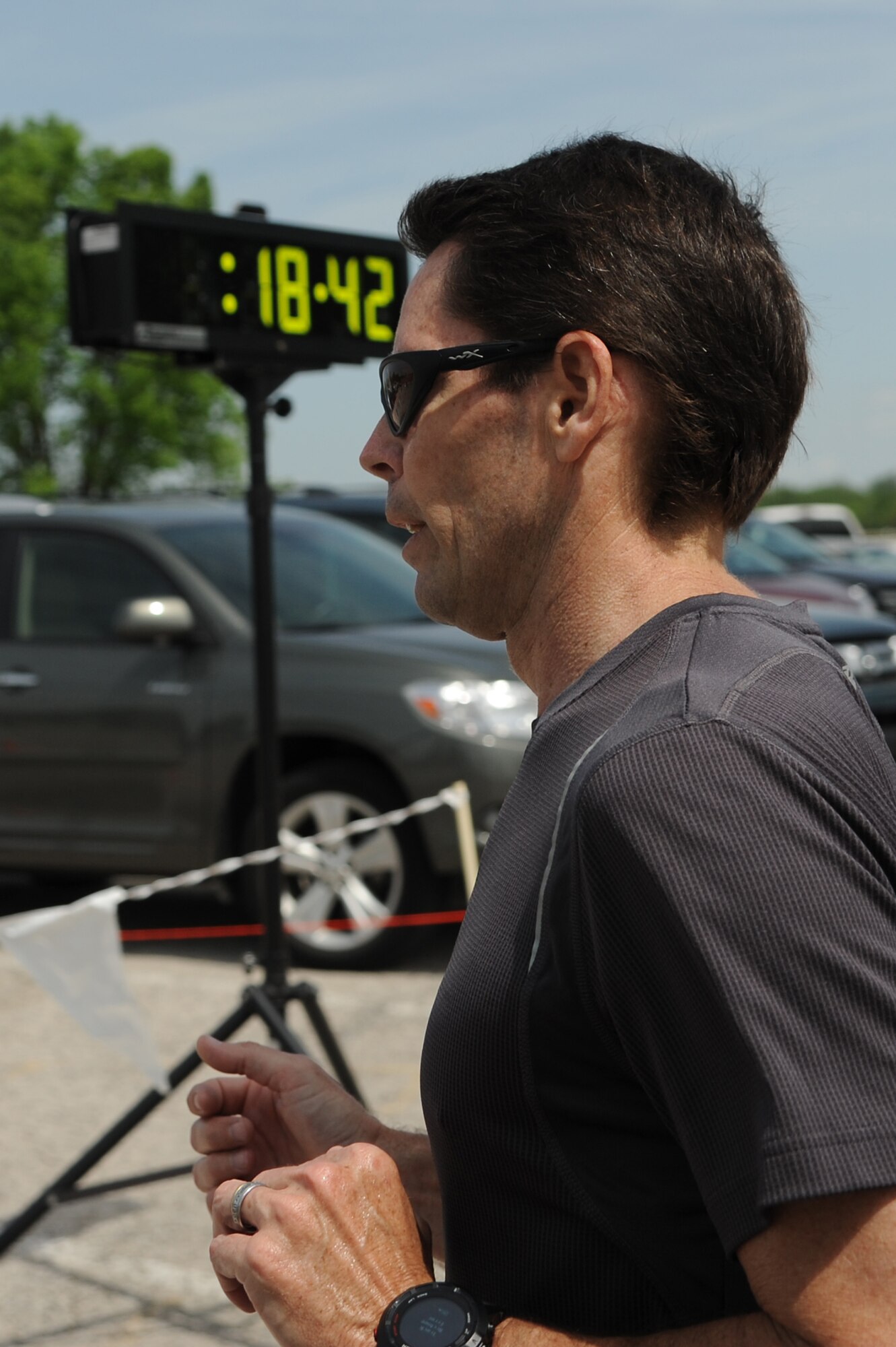 To promote Military Spouse Appreciation Day, and to give thanks to the spouses on Scott Air Force Base, the spouses held a 5K run for all who have access to the base May 9, 2014, Scott AFB, Ill. Participants arrived in teal outfits, capes, and headbands. Some individuals ran with their kids, or even let their kids run. Awards were given to the fastest male and female, and the first kid to cross the finish line. (U.S. Air Force Photo/ Senior Airman Tristin English)