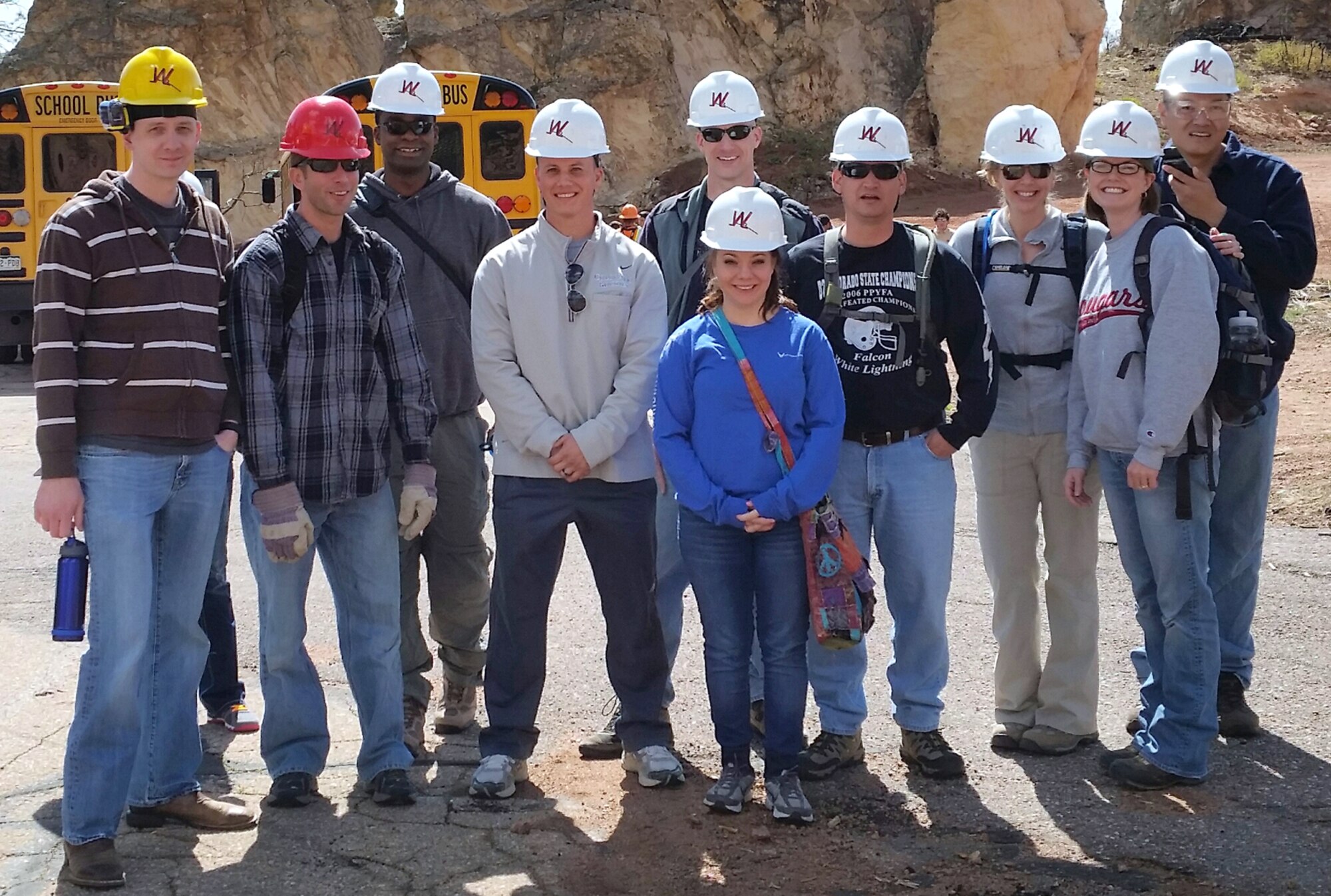 Air Force Reservists from the 310th Operations Support Squadron pose for a photo after a day of re-seeding and mulching fire-scarred land May 9, 2014 at the Flying W Ranch in Colorado Springs, Colo. The 310 OSS members were joined by other members of the local community and the entire sophomore class from Pueblo High School to help repair the environment and support the community after the loss and destruction of the Waldo Canyon fire June 26, 2012.
(U.S. Air Force photo/Tech. Sgt. Thomas Johnson)