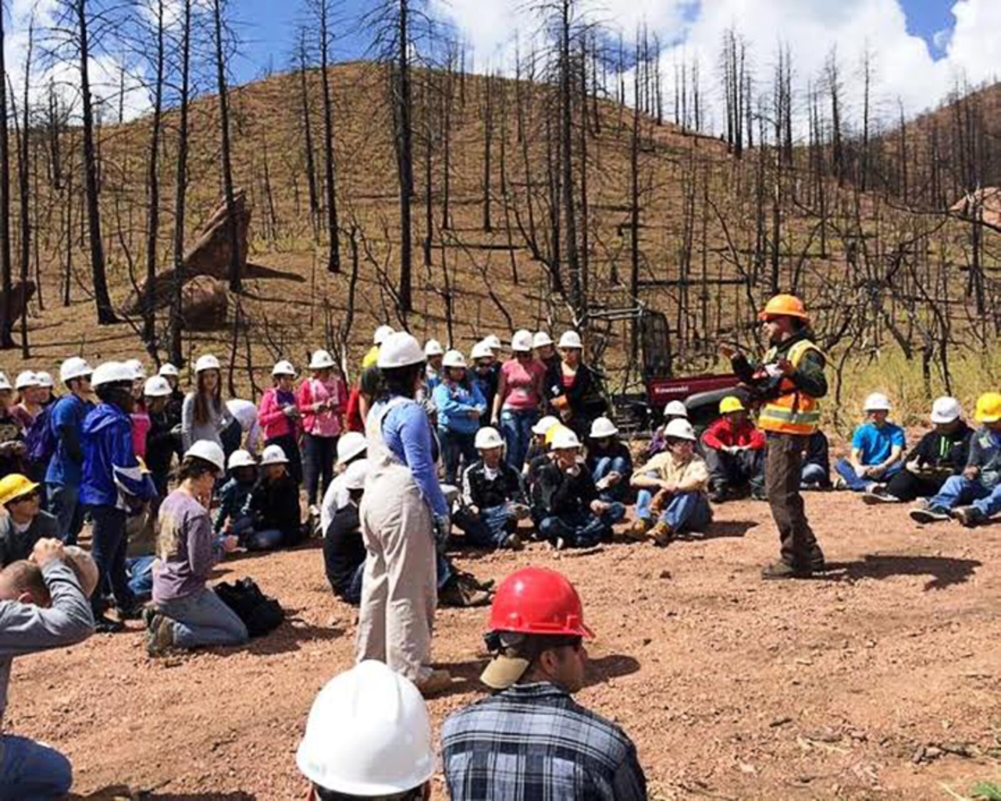 Air Force Reservists from the 310th Operations Support Squadron receive instructions before heading out to re-seed and mulch fire-scarred land May 9, 2014 at the Flying W Ranch in Colorado Springs, Colo. The 310 OSS members were joined by other members of the local community and the entire sophomore class from Pueblo High School to help repair the environment and support the community after the loss and destruction of the Waldo Canyon fire June 26, 2012.
(U.S. Air Force photo/ Senior Airman Jeffrey Heredia)