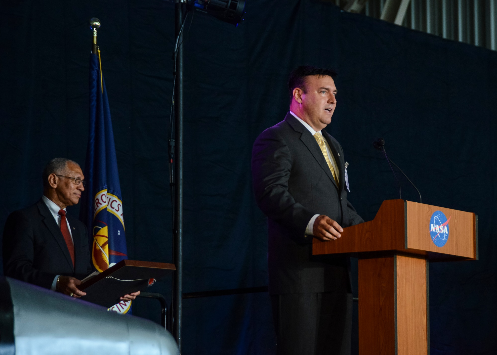 Hugh Dryden’s grandson, Eric Dryden, addresses the audience about the pride his grandfather would have felt “passing the torch” during the rededication ceremony at NASA Armstrong Flight Research Center facility on Edwards Air Force Base. (U.S. Air Force photo by Rebecca Amber)
