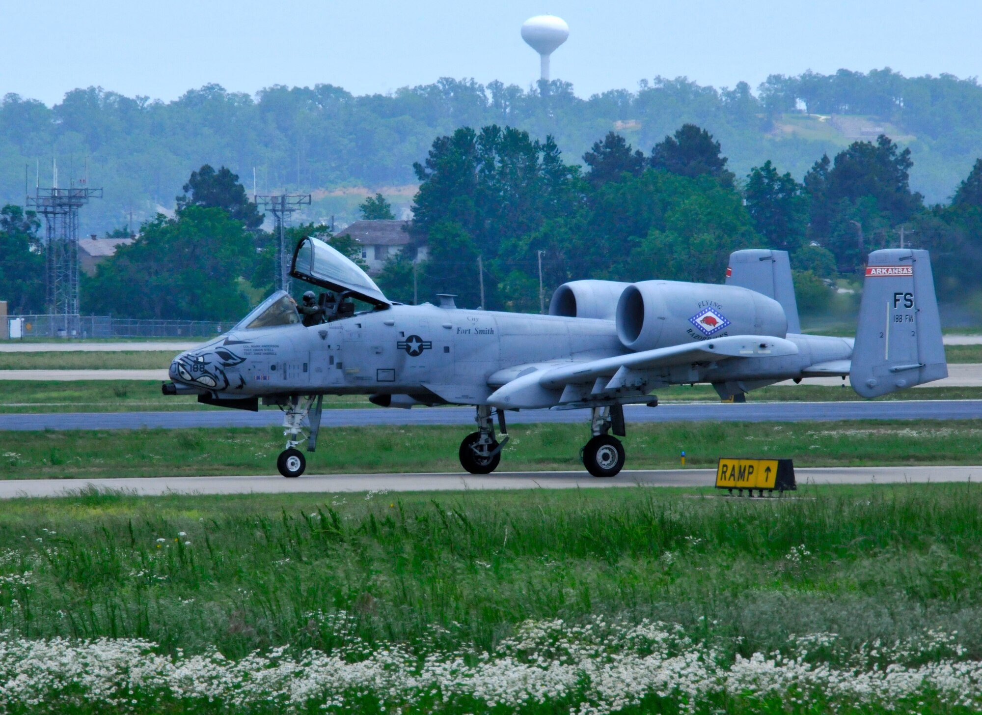 Col. Mark W. Anderson, 188th Fighter Wing commander, taxies on the ramp following final training mission in an A-10C Thunderbolt II “Warthog”, at Ebbing Air National Guard Base, Fort Smith, Arkansas, May 12, 2014. The ceremonial "fini" flight was Anderson’s final sortie until he flies the last A-10 out of Ebbing ANG Base  June 7, 2014, following the wing’s conversion ceremony. The 188th will convert from a fighter mission to a remotely piloted aircraft (MQ-9 Reapers), targeting, intelligence, surveillance and reconnaissance mission (U.S. Air National Guard photo by Tech. Sgt. Josh Lewis/released)  