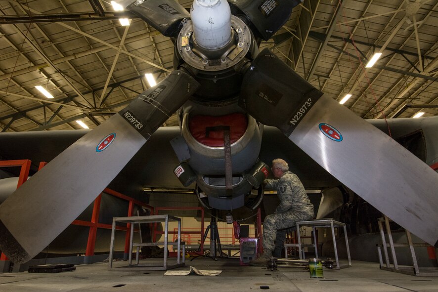 U.S. Airman Tech Sgt. Leo Batliner, from the 139th Maintenance Group, Missouri Air National Guard, performs an isochronal inspection on one of the engines of a C-130H Hercules aircraft at Rosecrans Air National Guard Base in St. Joseph, Mo., May 13, 2014.  Aircraft mechanics are required to preform these inspections every 540 days.  (U.S. Air National Guard photo by Senior Airman Patrick P. Evenson/Released)