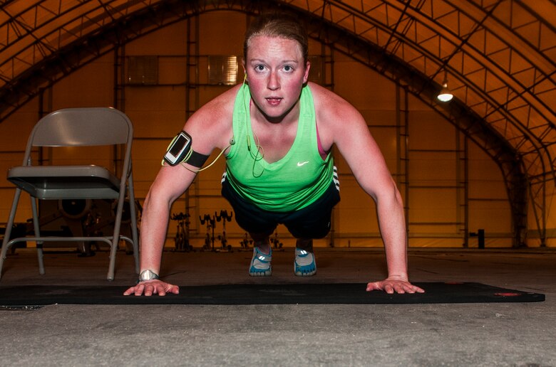 Jennea Jenkins, 50th Civil Engineer Squadron, performs push-ups during “The Murph” competition May 9, 2014, at Schriever Air Force Base, Colo. Jenkins finished “The Murph” in 42:38 to garner the fastest time for females. (U.S. Air Force photo/Staff Sgt. Julius Delos Reyes)