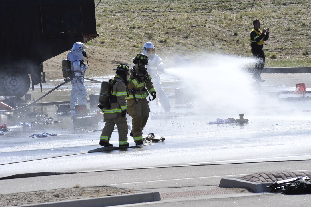 COLORADO SPRINGS, Colo. – The Peterson Fire Department, along with other fire departments from around the area, were some of the first responders to the simulated airplane crash on the southern end of the Colorado Springs Airport. The Peterson AFB Fire Department is the first responder for any aircraft crashes through a mutual aid agreement with the city of Colorado Springs. The event was part of a larger emergency response exercise called SkyFall, which consisted of a massive collaboration between multiple agencies throughout the Colorado Springs region. (U.S. Air Force photo/Robb Lingley)