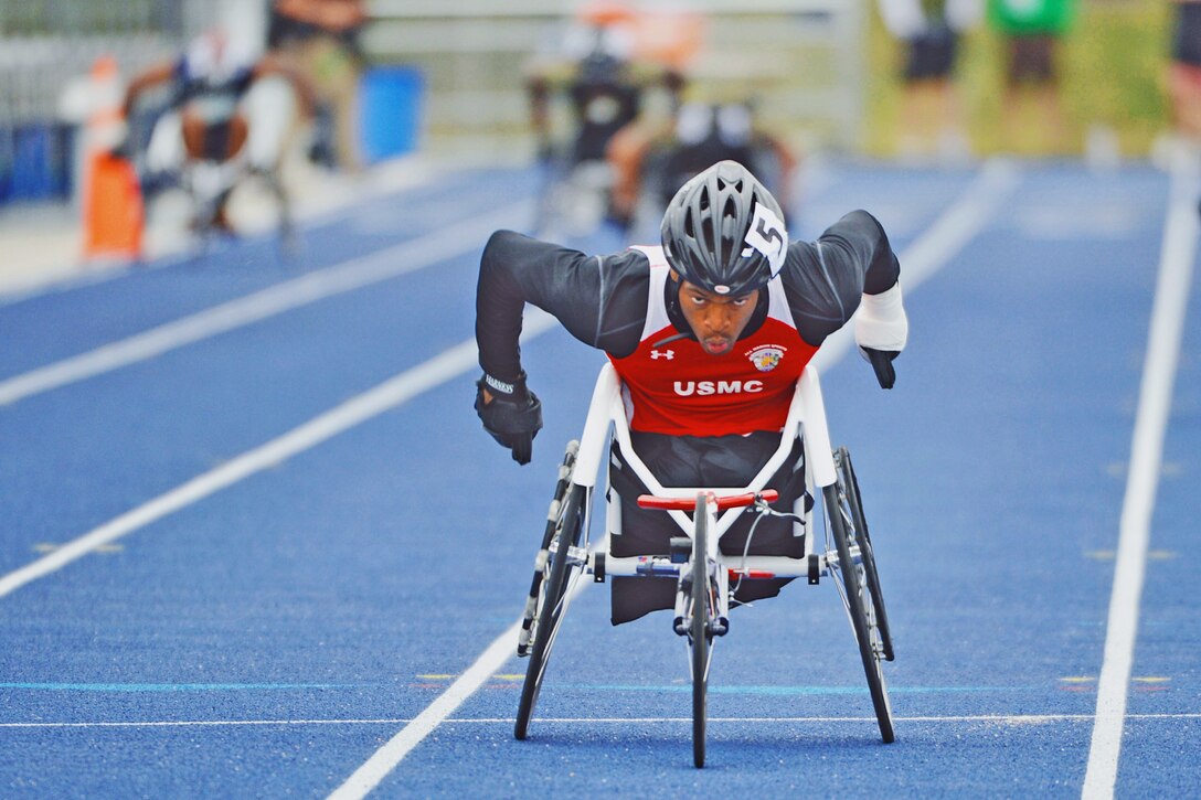 Marine Cpl. Anthony McDaniel wins the men's 200-meter wheelchair race during the 2013 Warrior Games in Colorado Springs, Colo., May 14, 2013.  
