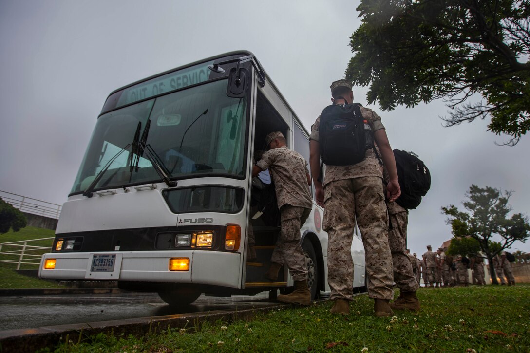 Marines with Battalion Landing Team 3rd Battalion, 5th Marines, 31st Marine Expeditionary Unit, board busses en route to Camp Hansen following their arrival on island, May 14. BLT 3/5 is replacing BLT 2/5 as the 31st MEU’s Ground Combat Element for the next six months, accompanying the MEU to for the upcoming annual Fall Patrol. The 31st MEU is the Marine Corps’ force of choice for the Asia-Pacific region and is the only continuously-forward deployed MEU.