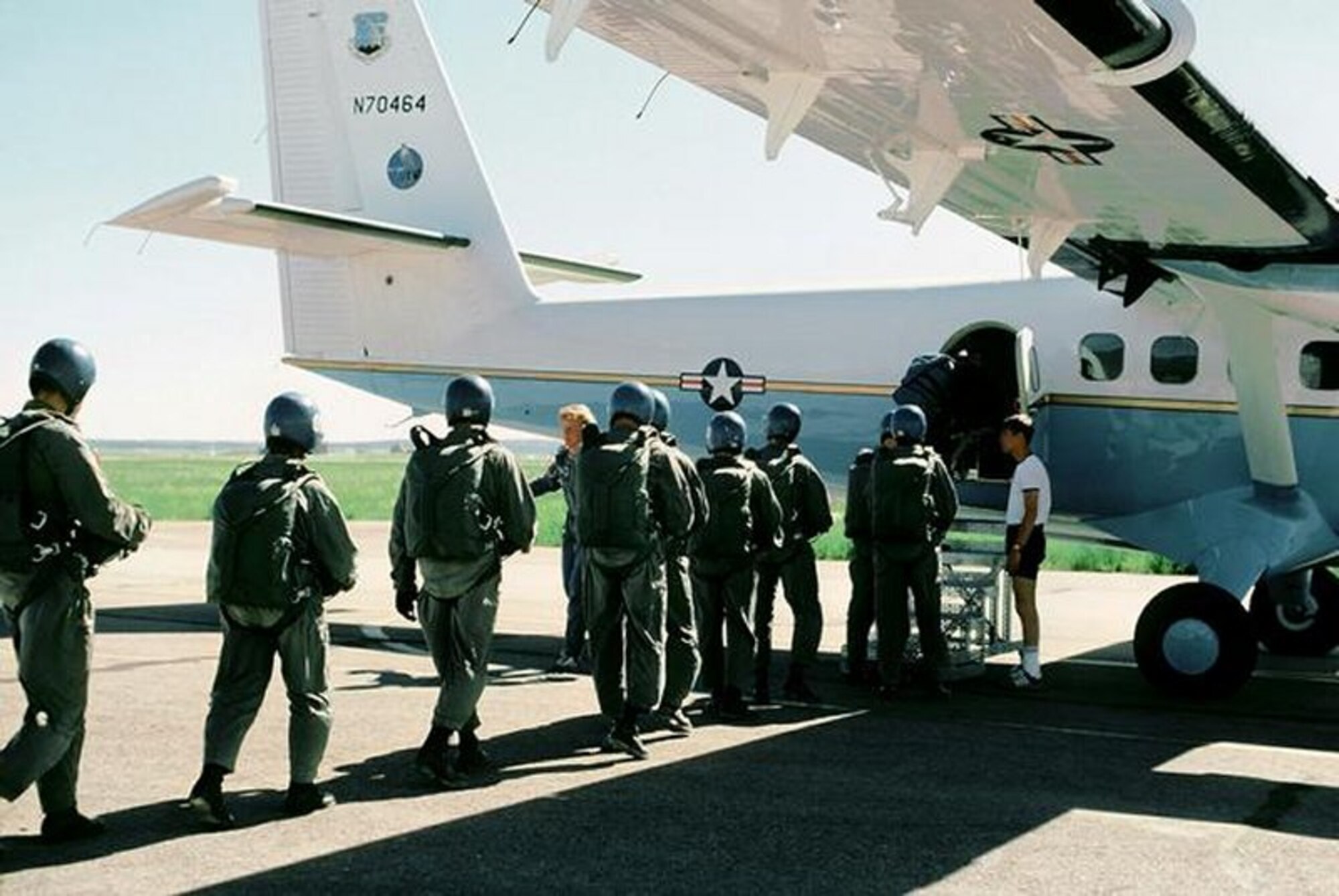 Wings of Blue team boarding a plane in the 1990's. (Courtesy Photo)