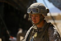 Lance Cpl. Matthew Winans, a data wire technician with Combat Logistics Regiment 1, attends a brief before conducting a security patrol during Exercise Desert Scimitar at Marine Corps Air Ground Combat Center Twentynine Palms, Calif., May 12, 2014. It is not uncommon for Marines like Winans, a native of Chicago, to be called upon to maintain security during field training. 1st Marine Division acts as the headquarters element of I Marine Expeditionary Force during the exercise.