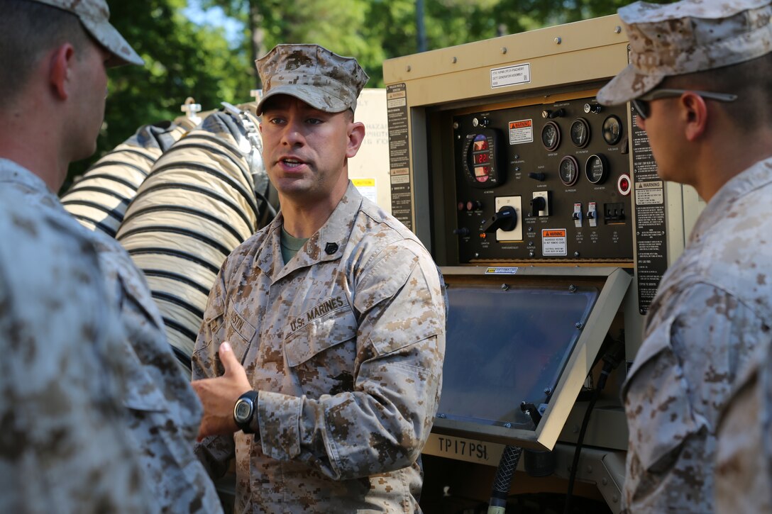 Staff Sgt. Taylor Austin gives a group of Marines a class on generators and their use in a field environment at Marine Corps Auxiliary Landing Field Bogue May 8. Marines with Marine Wing Support Squadron 271 were conducting their annual Communication Exercise May 5 – 9.
