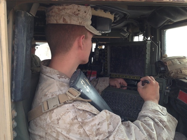 A Marine with the 2nd Battalion, 8th Marine Regiment from Camp Lejeune, North Carolina, operates Joint Battle Command-Platform inside a vehicle during Network Integration Evaluation 14.2 at Fort Bliss, Texas. About 900 Marines joined the Soldiers of the 2nd Brigade Combat Team, 1st Armored Division at the evaluation, which serves as an operational laboratory to incrementally enhance the Army's tactical network. JBC-P, a new situational awareness capability for the Army and Marine Corps, is built with today's force in mind featuring touch-to-zoom maps, drag-and-drop icons and a Google Earth-like interface. 