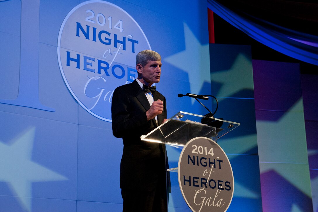 Nineteenth Chief of Staff of the Air Force retired General Norton A. Schwartz makes opening remarks for the American Hero Award during the PenFed Foundation’s Night of Heroes Gala May 14, 2014, before presenting the award to the Secretary of the Air Force Deborah Lee James. (U.S. Air Force photo/Staff Sgt. Carlin Leslie)