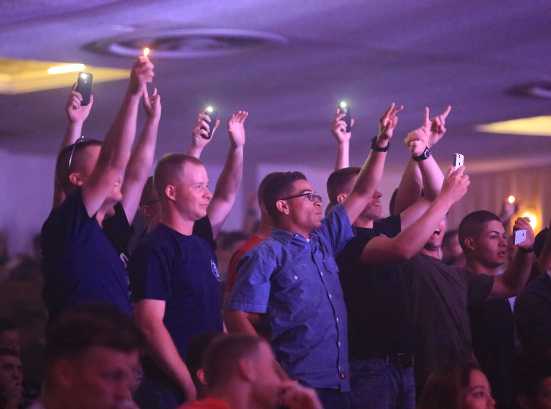 Marines and sailors enjoy the Leatherneck Comedy and Entertainment Tour at the Base Theater aboard Marine Corps Base Camp Lejeune, May 9. The tour gave more than 1,000 service members aboard base an opportunity to relax while watching various entertaining acts including comedians, a disk jockey, dancers and more. 