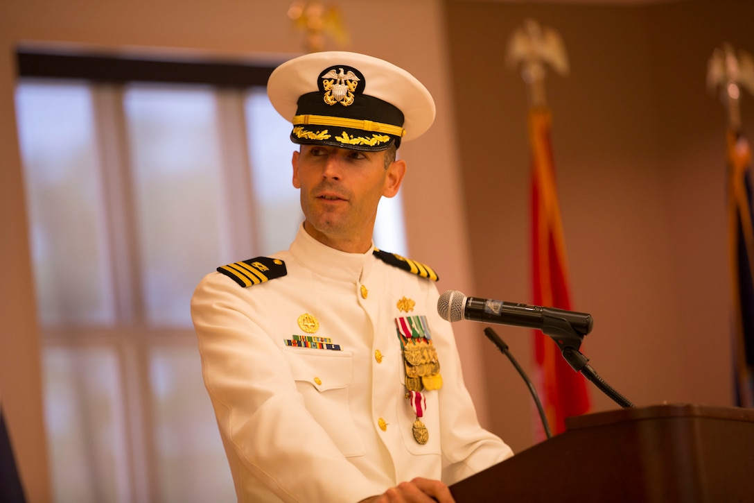 Cmdr. Scott Cloyd, the outgoing officer in charge of construction, speaks during the disestablishment ceremony of Marine Corps Installations East Officer in Charge of Construction office at the Marston Pavilion aboard Marine Corps Base Camp Lejeune, May 6. The OICC was a unique office created to manage a large influx in construction during the last six years. Cloyd has led the OICC for the last two years.  