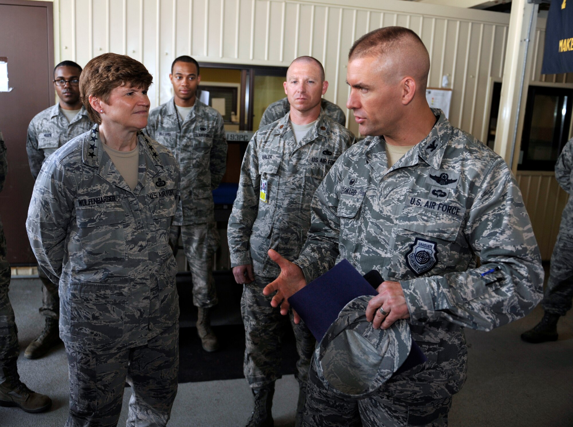 Col. Brook Leonard, 51st Fighter Wing commander, talks to Gen. Janet Wolfenbarger, Air Force Materiel Command commander, about the mission of the aircraft parts store on Osan Air Base, Republic of Korea, May 14, 2014. Wolfenbarger visited other locations on base in addition to the aircraft parts store, including the Gen 3 and phase hangars. (U.S. Air Force photo/Senior Airman David Owsianka)
