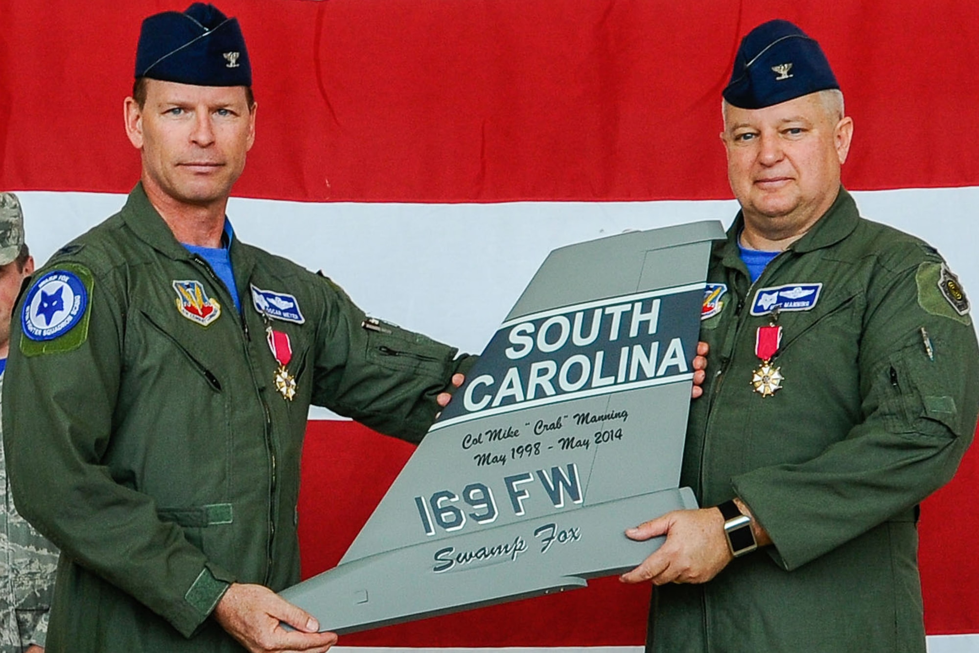 U.S. Airmen of the 169th Fighter Wing and the South Carolina Air National Guard, assemble for a change of command ceremony at McEntire Joint National Guard Base, S.C., May 3, 2014. Col. Michael Manning relinquishes command of the 169th Fighter Wing to Col. David Meyer (U.S. Air National Guard photo by Tech. Sgt. Jorge Intriago/Released)