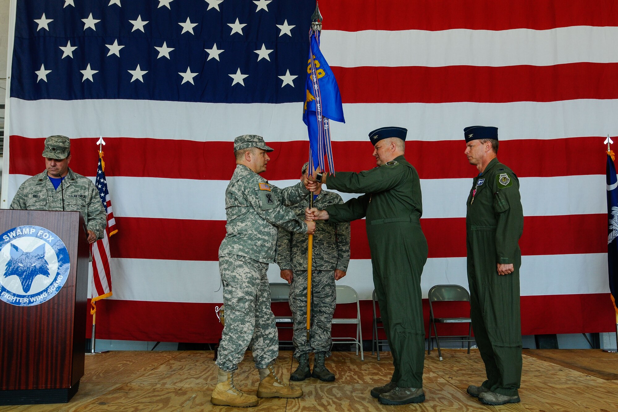 U.S. Army Maj. Gen. Robert E. Livingston Jr., The Adjutant General of South Carolina, presides over the formal change of command of the 169th Fighter Wing from Col. Michael Manning to Col. David Meyer. U.S. Airmen of the 169th Fighter Wing and the South Carolina Air National Guard, assemble for a change of command ceremony at McEntire Joint National Guard Base, S.C., May 3, 2014. (U.S. Air National Guard photo by Tech. Sgt. Jorge Intriago/Released)