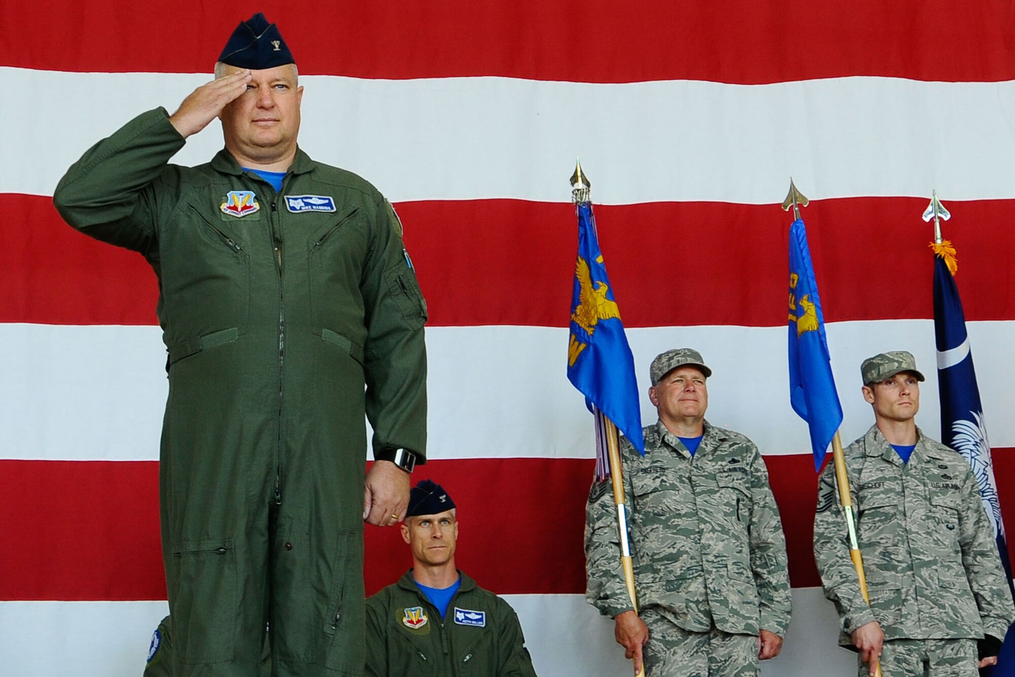 U.S. Air Force Col. Michael Manning receives his final salute from the men and women of the 169th Fighter Wing and the South Carolina Air National Guard, during a change of command ceremony at McEntire Joint National Guard Base, S.C., May 3, 2014. He relinquished command of the 169th Fighter Wing to Col. David Meyer. (U.S. Air National Guard photo by Tech. Sgt. Jorge Intriago/Released)