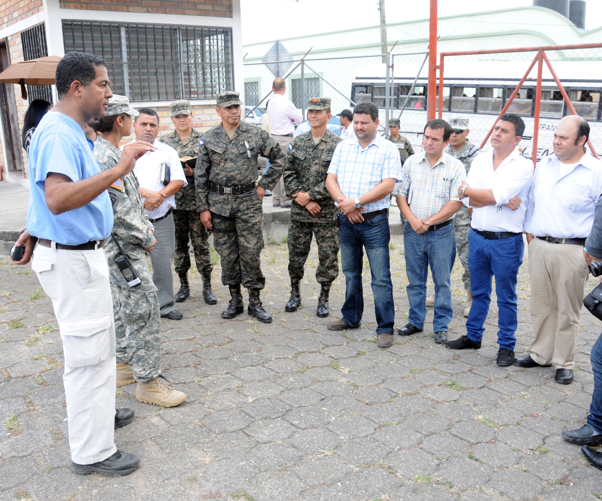 Key leaders from Joint Task Force-Bravo met with Honduran civic and military leaders at the Mobile Surgical Team's site of a Medical Readiness and Training Exercise (MEDRETE) being conducted in the town of Santa Rosa de Copan, Department of Copan, Honduras, May 7, 2014.  The Task Force and Honduran leaders engaged in discussions on how to build on the strong relationship between the U.S. and Honduras, how Joint Task Force-Bravo can continue to partner with Honduras in order to provide assistance to those in need and toured the Mobile Surgical Team's mobile operating room where U.S. and Honduran medical professionals were working side-by-side conducting gall bladder and hernia repair surgeries for eight local citizens.