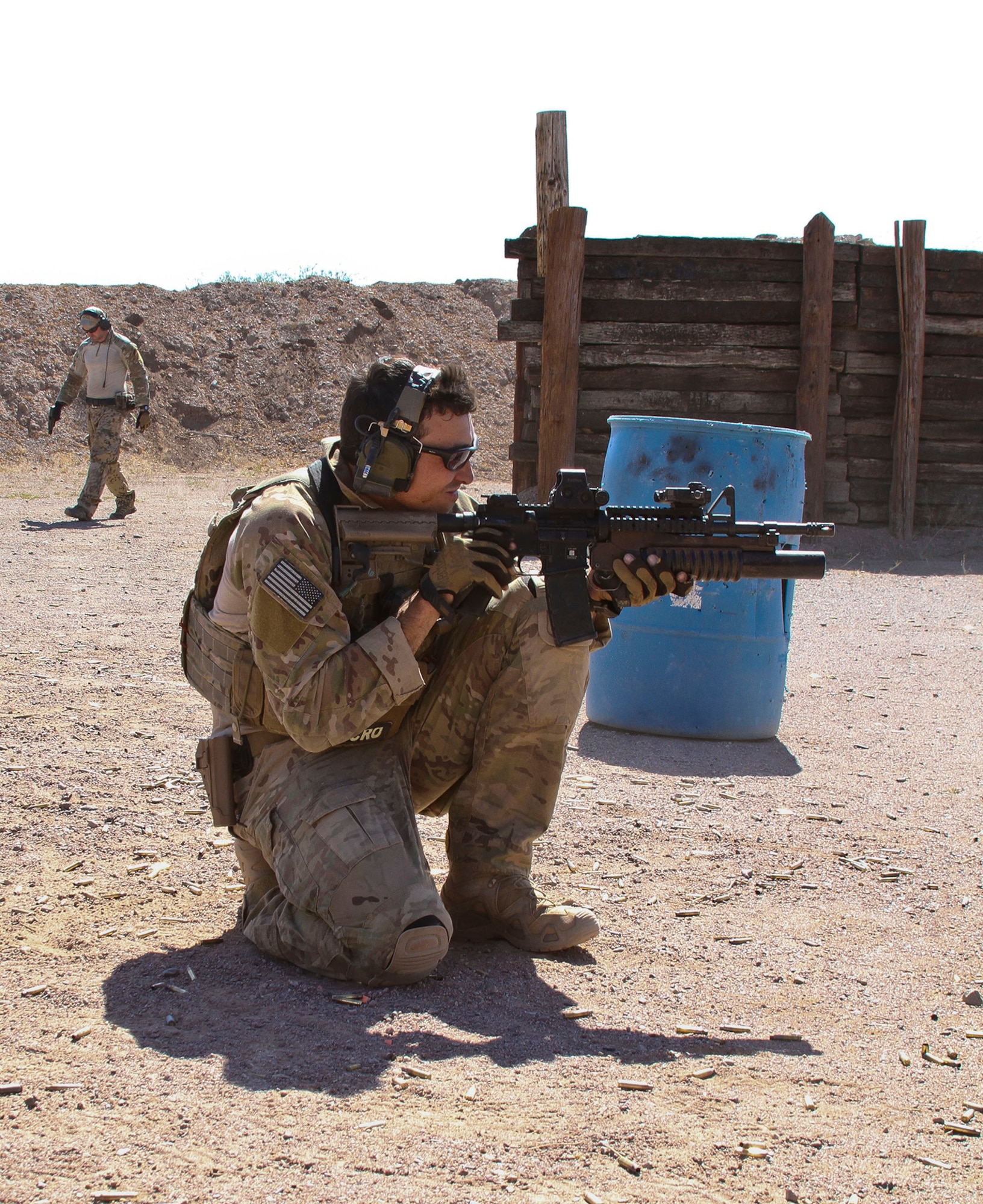 U.S. Airmen train on various firing tactics during Exercise ANGEL THUNDER at Three Points Firing Range in Tucson, Ariz., May 12, 2014.  ANGEL THUNDER is the only exercise in the Department of Defense covering personnel recovery training across the full spectrum of irregular and conventional warfare and has become the world’s largest and most complex personnel recovery exercise. Through the use of joint training, members are able to hone their development of the four core functions of personnel recovery which include preparing, planning, execution, and adaptation. ANGEL THUNDER is designed to provide state of the art rescue training for the total Air Force rescue community, as well as Joint U.S. Military, federal government agencies, local communities, non-governmental agencies and allied nations.  (U.S. Air Force photo by Tech. Sgt. Heather R. Redman/Released)