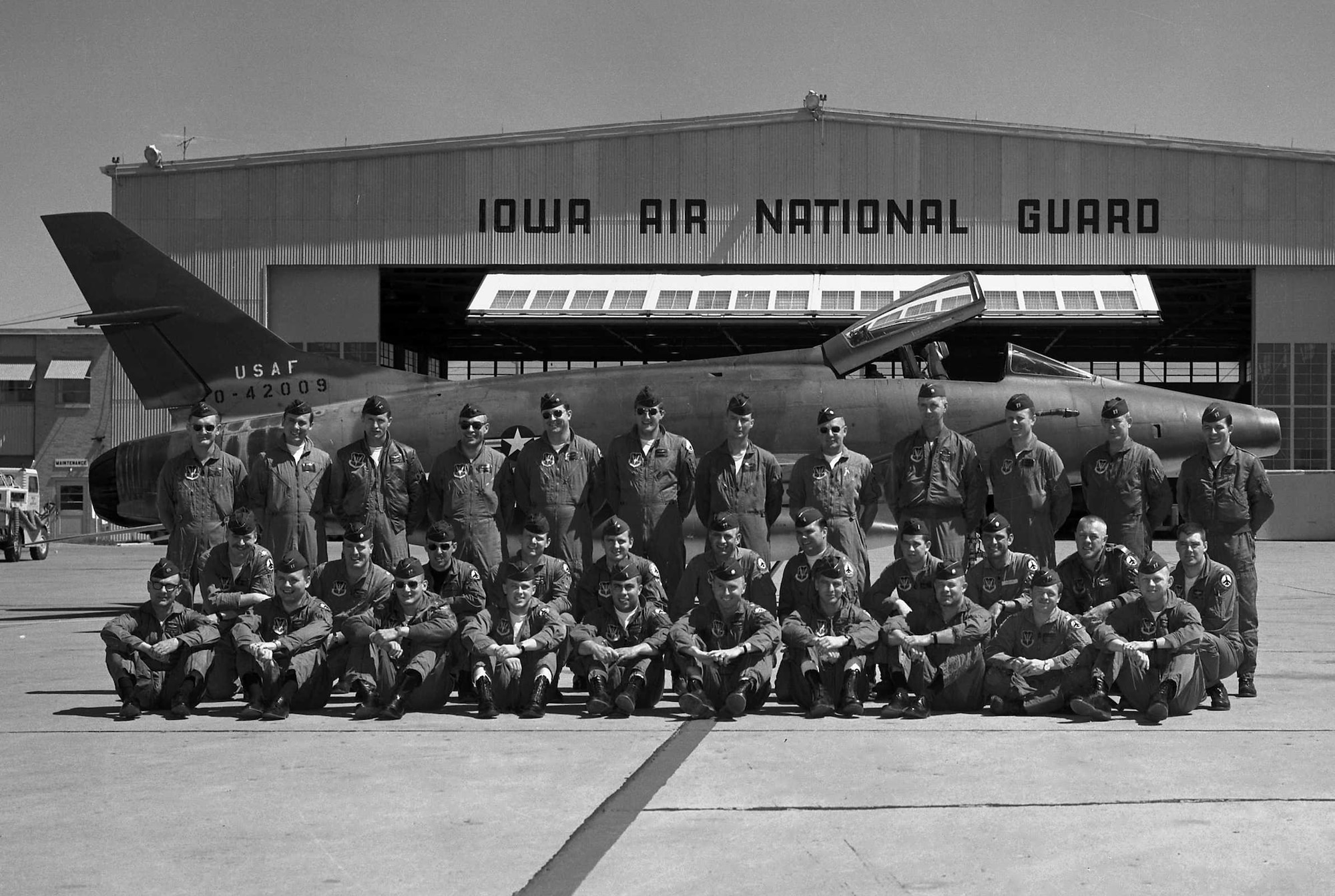 F-100 pilots from the 185th Tactical Fighter Group pose in front an F-100 Super Saber at the Air National Guard Base in Sioux City, Iowa. The 174th Tactical Fighter Squadron was activated and sent to Vietnam in January 1968 and returned to Sioux City in May 1969. The photo was taken prior to 1968.