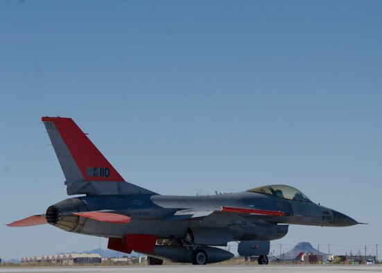 An unmanned QF-16 aircraft prepares to participate in a graduation exercise at Holloman Air Force Base, N.M., May 14.  The graduation exercise tests the aircraft’s capabilities and connectivity to the White Sands Test System at White Sands Missile Range.  The unmanned QF-16’s were converted to remotely piloted aircraft from retired F-16 Fighting Falcons.  This is the second unmanned QF-16 to launch in history and the first to launch at Holloman AFB.  (U.S. Air Force photo by Staff Sgt. E’Lysia Wray/Released)