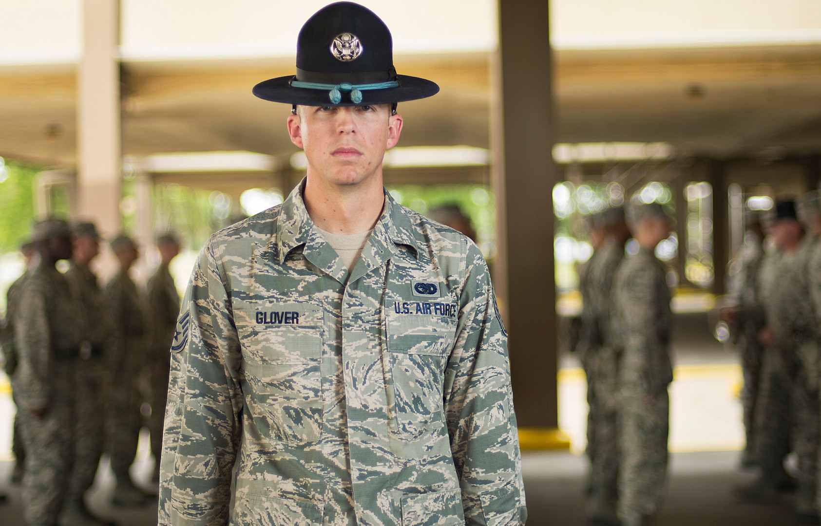 Staff Sgt. Eddie Glover, oversees a flight formation inspection at the 322nd Training Squadron April 17, at Joint Base San Antonio-Lackland. Staff Sgt. Glover was named the 2014 Military Training Instructor of the Year.  (U.S. Air Force photo by Benjamin Faske) (released)