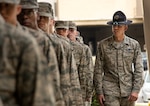 Staff Sgt. Eddie Glover, insures that a flight of basic trainees are properly aligned in formation at the 322nd Training Squadron April 17, at Joint Base San Antonio-Lackland. Staff Sgt. Glover was named the 2014 Military Training Instructor of the Year.  (U.S. Air Force photo by Benjamin Faske) (released)