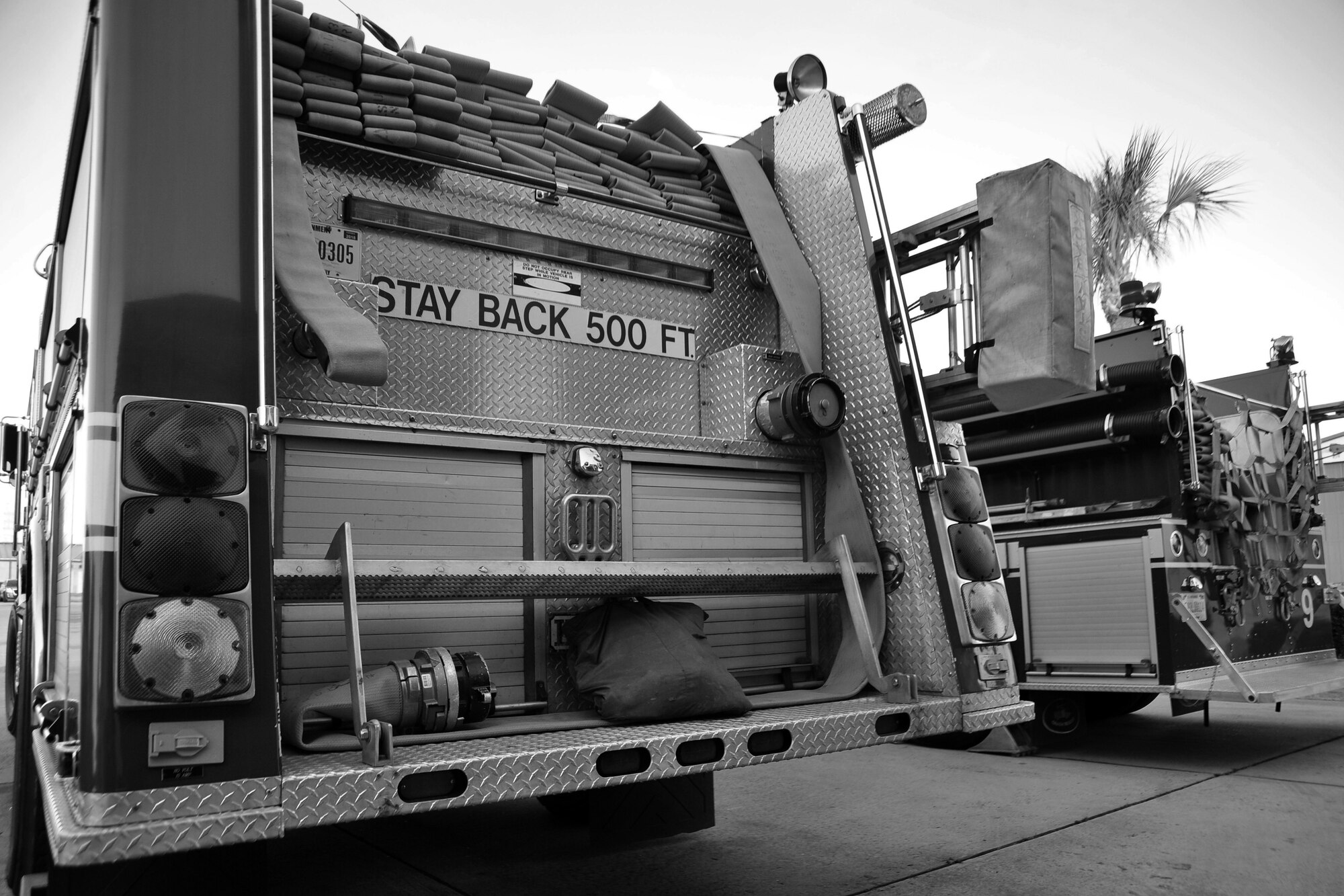 Two firefighting trucks are parked in front of the 325th Civil Engineering Squadron Fire and Emergency Services building May 8 at Tyndall’s Fire Station 1. Every vehicle is inspected thoroughly each morning. (U.S. Air Force photo by Airman 1st Class Sergio A. Gamboa)