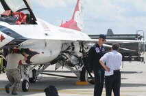 Local media representative Jim Michaels interviews Maj. Jason Curtis, U.S. Air Force Thunderbird pilot here, May 12th. The Thunderbirds will perform May 17 and 18 at the 2014 Thunder Over the Valley Air Show here. (U.S. Air Force photo by Senior Airman Rachel Kocin)