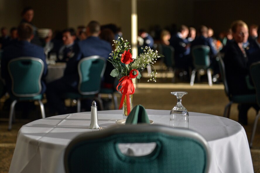 The missing man table is represented at the front of the American Lake Conference Center banquet room, May 14, 2014, during the 22nd Special Tactics Squadron awards ceremony and dining-out at Joint Base Lewis-McChord, Wash. As the Airmen entered the dining area, they noticed the table at the front, raised to call their attention to its purpose as it was there to honor their missing loved ones. (U.S. Air Force photo/Staff Sgt. Russ Jackson)
