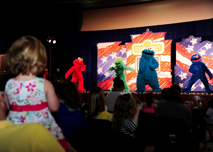 Joint Base Andrews families attend the Sesame Street/USO Experience for Military Families at Joint Base Andrews, Md., May 14, 2014. The seven month stateside tour began April 4 at Scott Air Force Base, Illinois, and is slated to perform more than 200 shows at 69 bases by the end of October.The performances, brought to them by the USO, told the story of Katie, a military child who just found out she will be relocating to a new place with her family. (U.S. Air Force photo/ Senior Airman Aaron Stout/released)