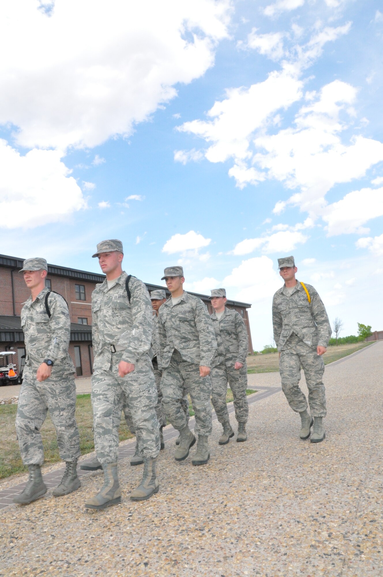 GOODFELLOW AIR FORCE BASE, Texas – Airman 1st Class Bradley Jenkins, 312th Training Squadron student and Airmen leader, marchs an element of students outside the 312th TRS dormitory here April 23. As a yellow rope, Jenkins has to march, counsel and train other Airmen to be professionals. (U.S. Air Force photo/ Airman 1st Class Breonna Veal)