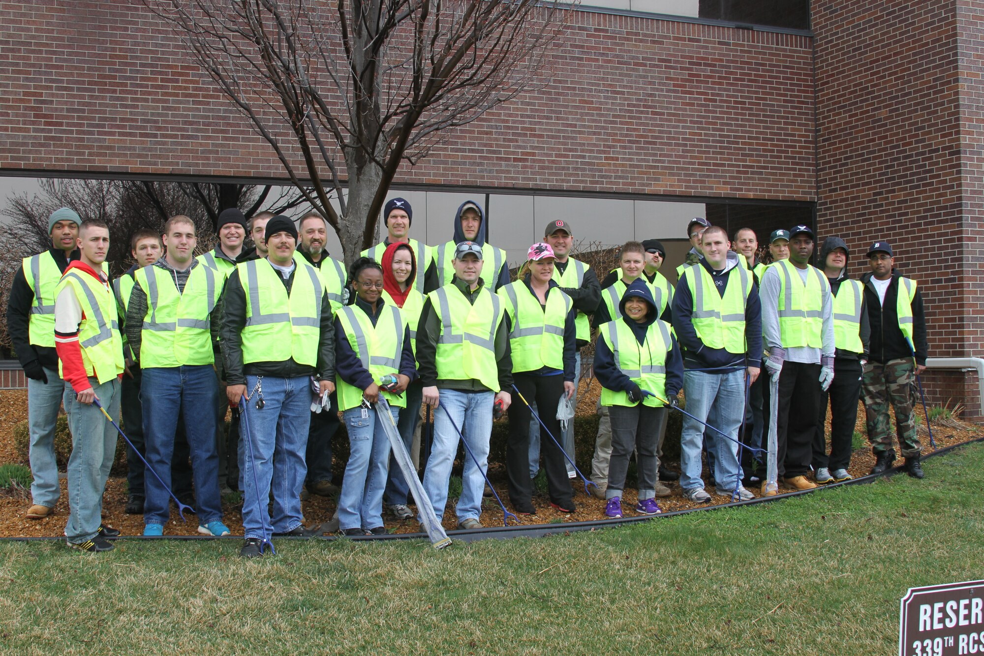 Twenty-five members of the 339th Recruiting Squadron and their families cleaned up a two-mile stretch of Interstate 94 near Selfridge Air National Guard Base, Harrison Township, Mich., April 18. They collected more than 220 bags of trash weighing more than 4,000 pounds. The 339th RCS participates in the Adopt-a-Highway program every April and September. (U.S. Air Force photo/Staff Sgt. Christian Manuel) 