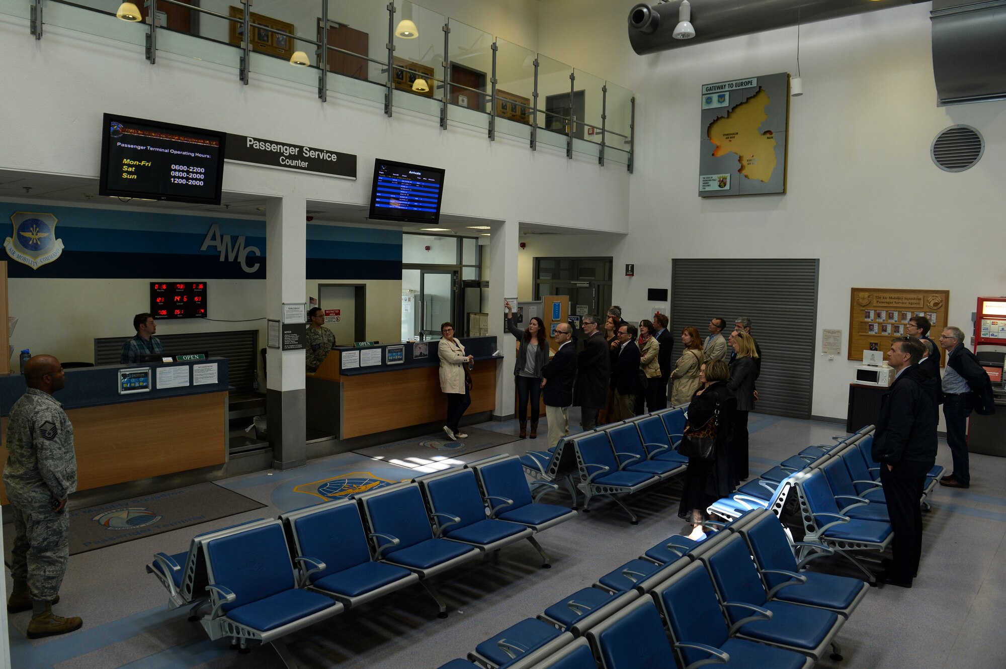 German medical providers tour the 726th Air Mobility Squadron Passenger Terminal during a Host Nation Hospital Leader Tour May 14, 2014, at Spangdahlem Air Base, Germany. The tour provided a chance for local medical providers to see firsthand the mission of the 52nd Fighter Wing. (U.S. Air Force photo by Senior Airman Rusty Frank/Released)