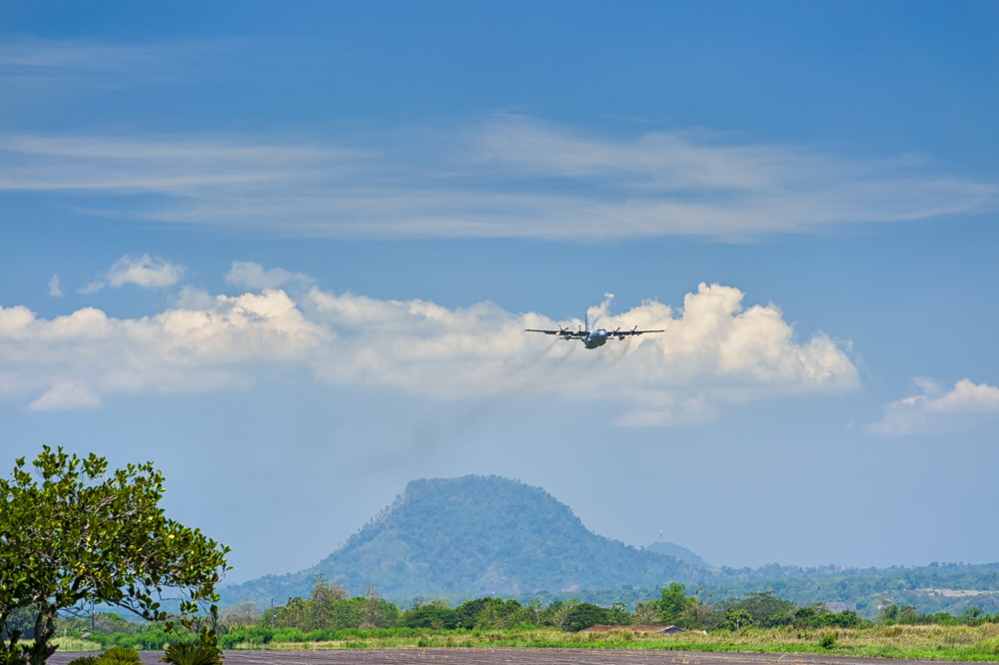 A U.S. Air Force C-130H assigned to the 36th Airlift Squadron, Yokota Air Base, Japan, takes to the sky during Exercise Balikatan near Subic Bay, Republic of the Philippines May 13, 2014. Balikatan, which means "shoulder to shoulder," is a bilateral training exercise involving 2,500 U.S. and 3,000 Philippine service members. (Courtesy photo by U.S. Air Force Maj. Teodoro Apalisok)