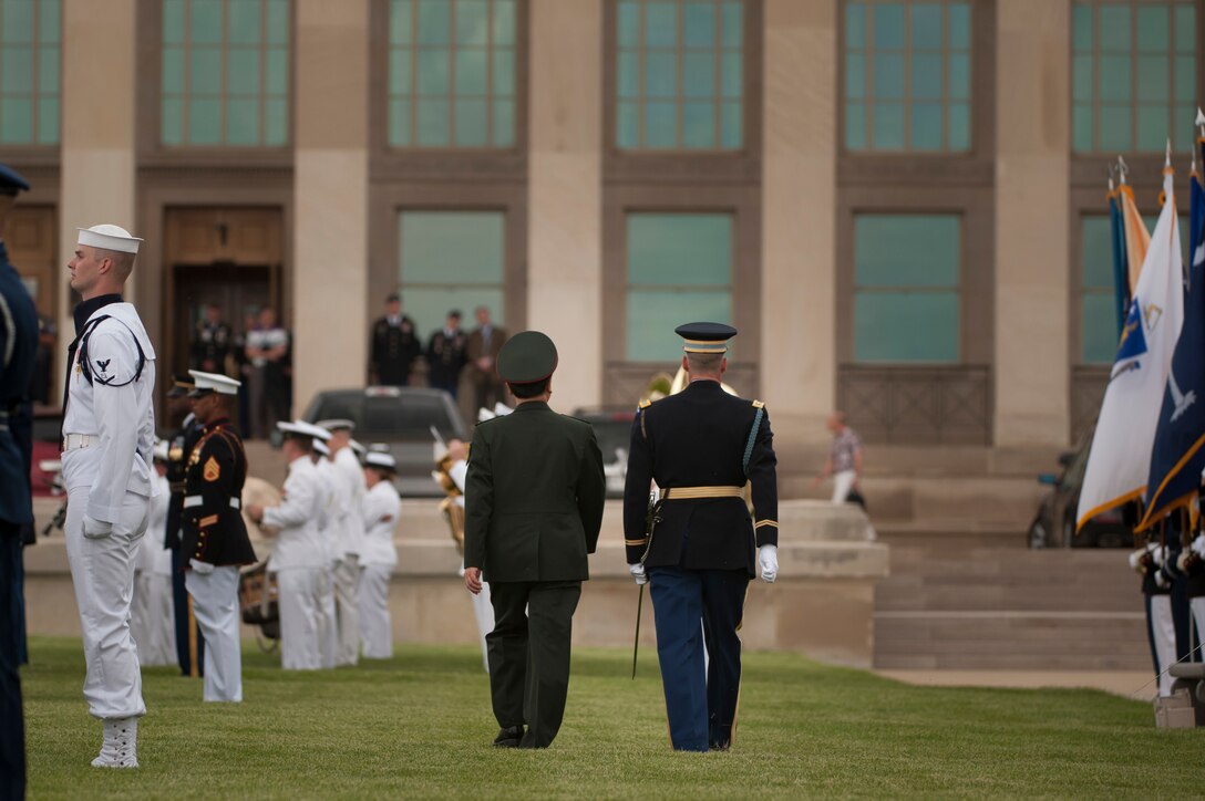 Chinese Army Gen. Fang Fenghui, chief of the general staff, reviews the troops during a full-honor arrival ceremony at the Pentagon, May 15, 2014.